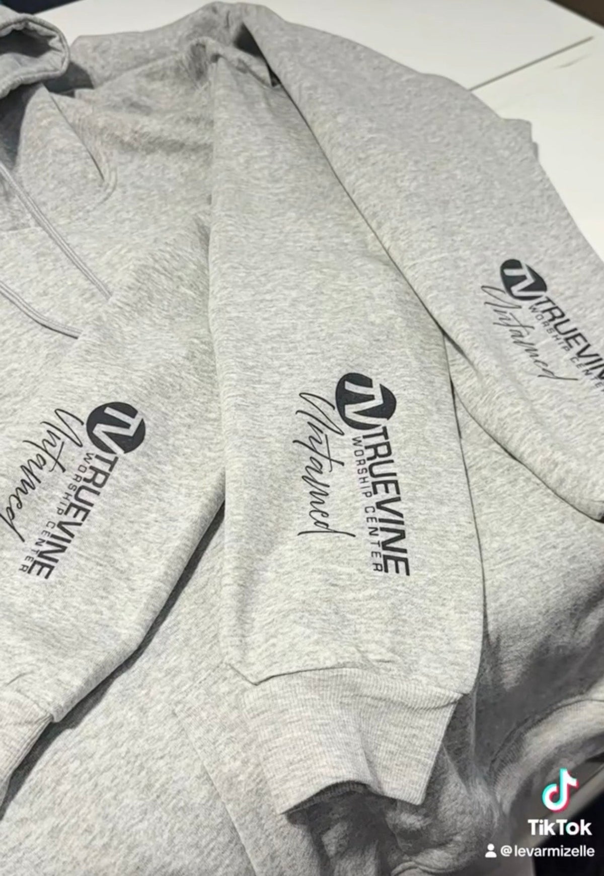 Completed gray Truevine Worship Center Untamed hoodies